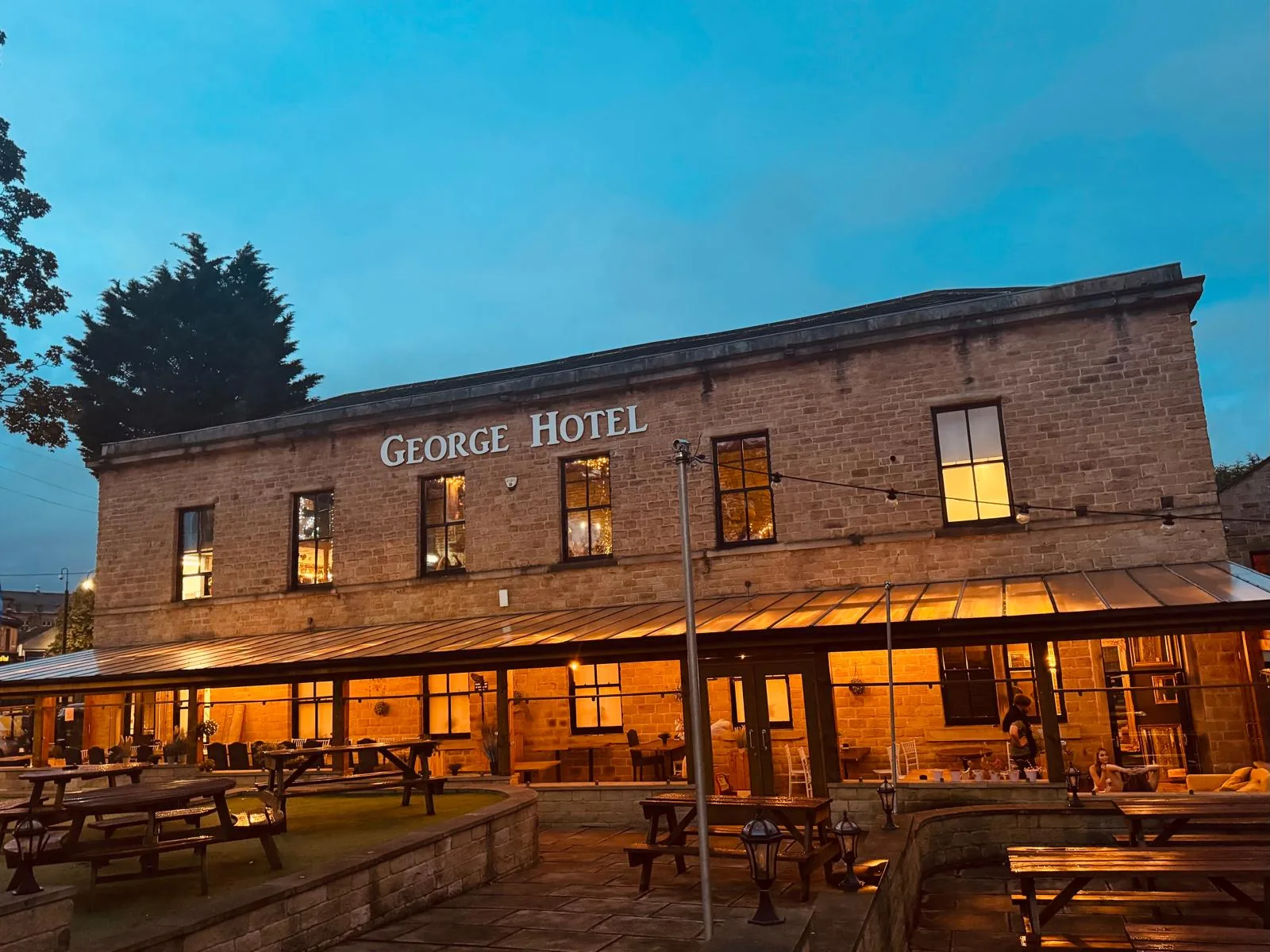 The George Hotel and terrace in Cleckheaton at dusk