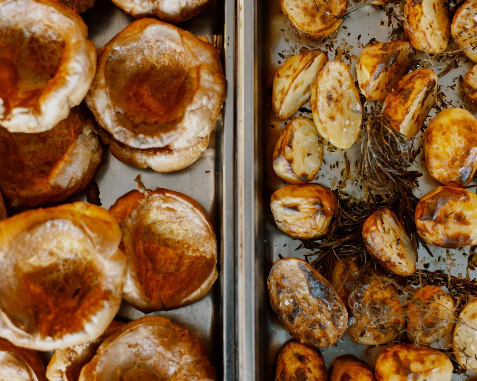 Yorkshire puddings and roast potatoes prepared at George's